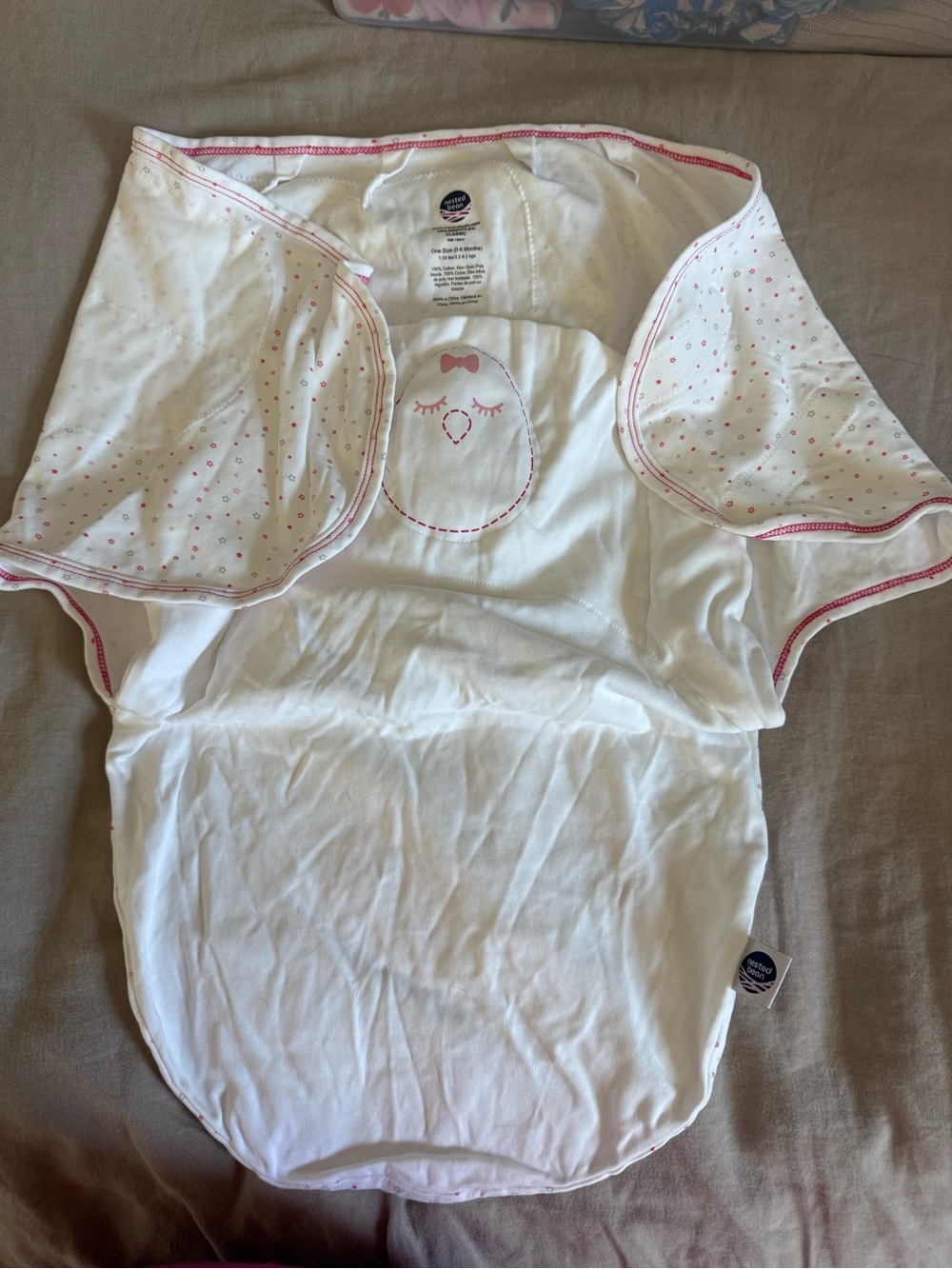 Nested Bean White Baby Swaddle with Pink Accents